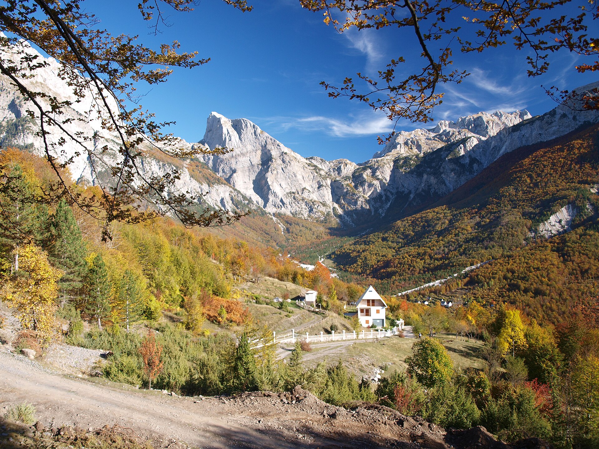 Theth village and valley surrounded by the jagged peaks of the Albanian Alps