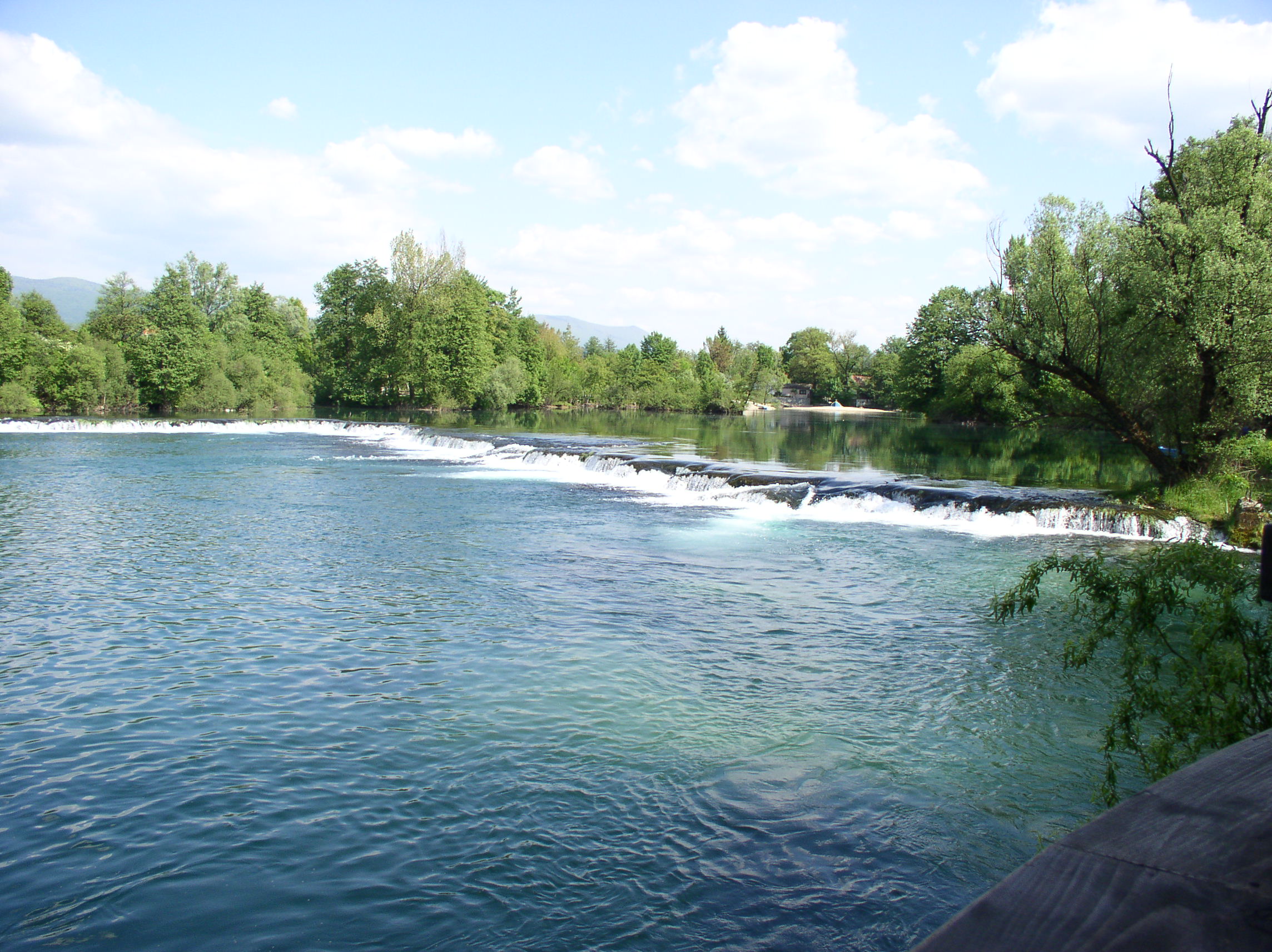 The clear green Una river flowing through the town of Bihac in Bosnia