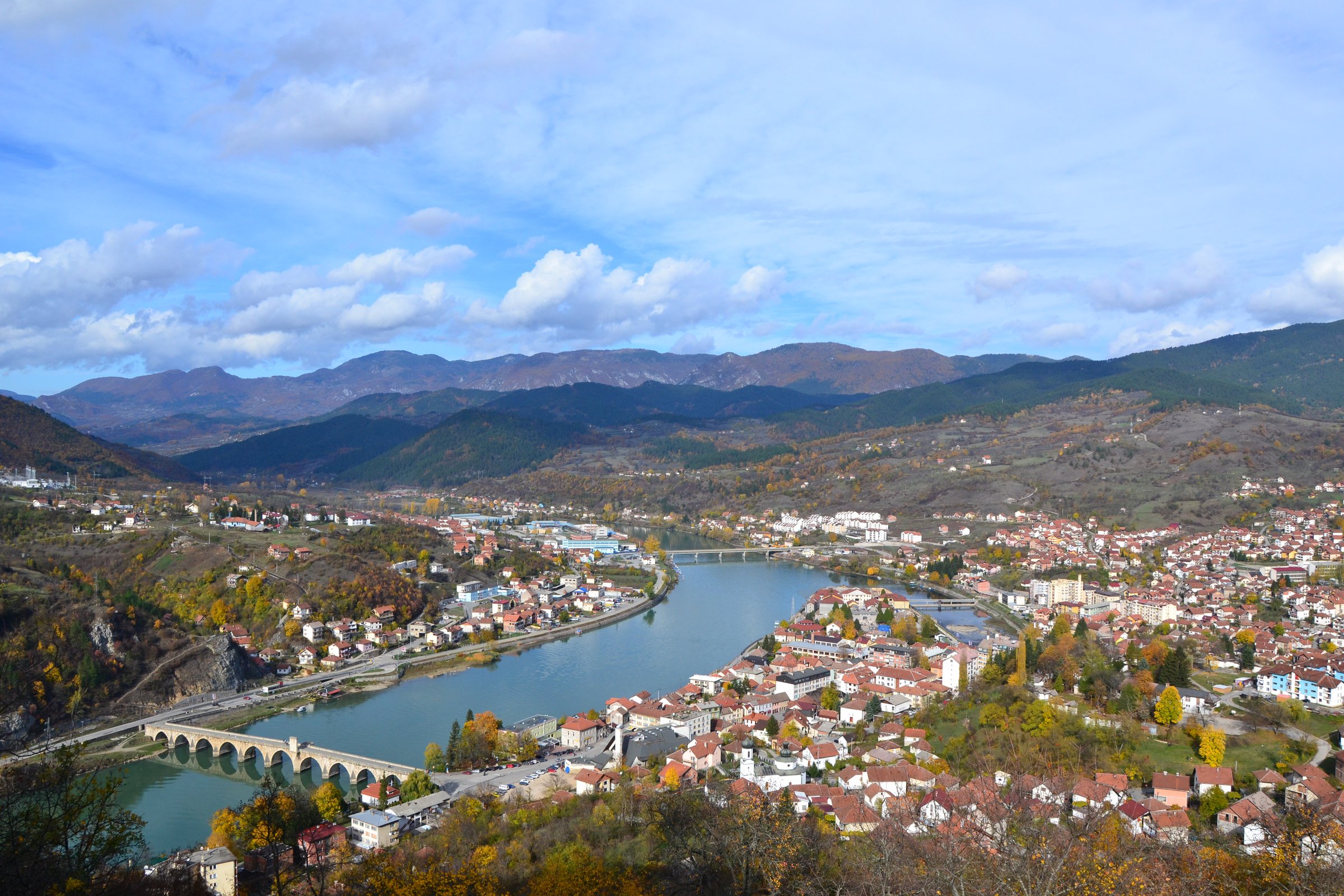 Panorama of Visegrad with the Drina river running green through the town