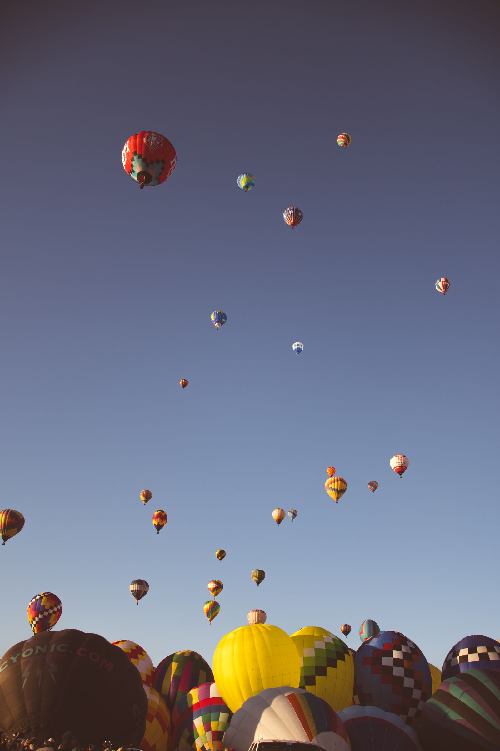 Colorful hot air balloons ascending at the Albuquerque Balloon Fiesta