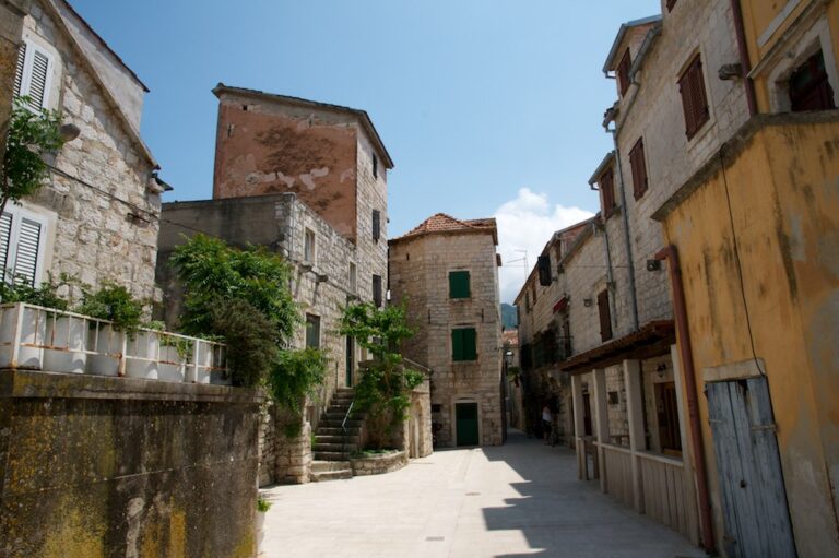 Sunny stone street in Stari Grad on Hvar island, Croatia