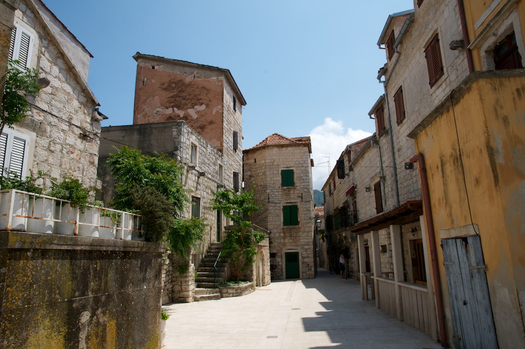Sunny stone street in Stari Grad on Hvar island, Croatia