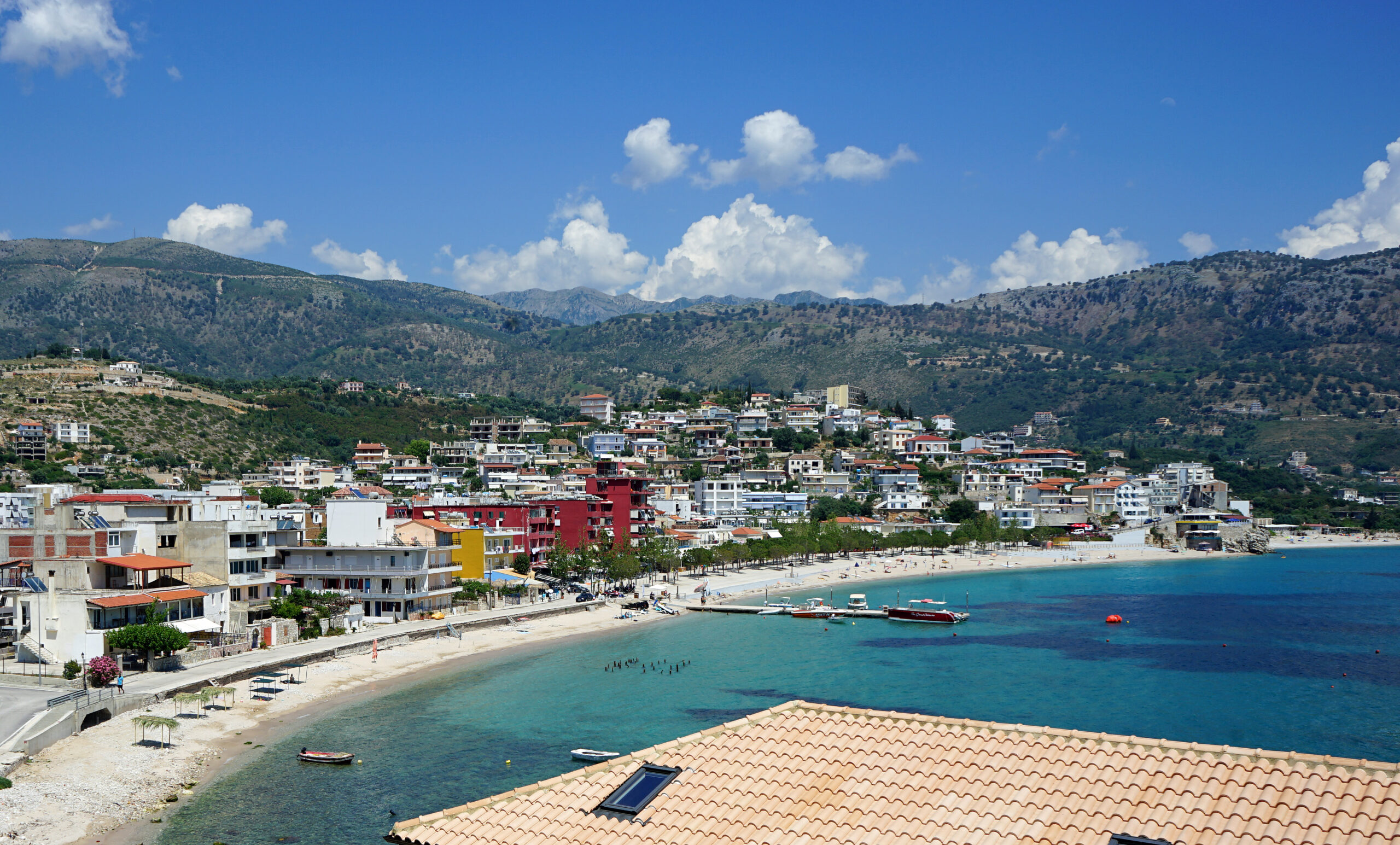 Himara town and its curving beach on the Albanian Riviera coast