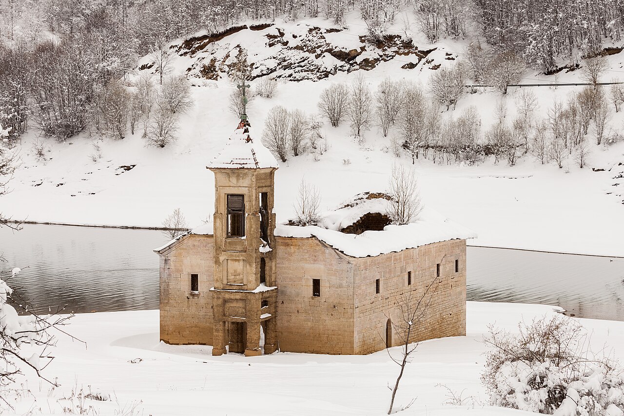 Church of St. Nicholas partly submerged in Mavrovo Lake, North Macedonia